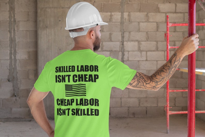 May include: A green t-shirt with the text "Skilled Labor Isn't Cheap" and "Cheap Labor Isn't Skilled" with an American flag graphic in between the text.