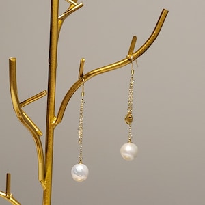 Gouden ketting parel smiley-oorbellen: sterlingzilveren paaltjes