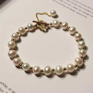 Gold Freshwater Pearl Bracelet: Lucky Clover Charm, Adjustable Length