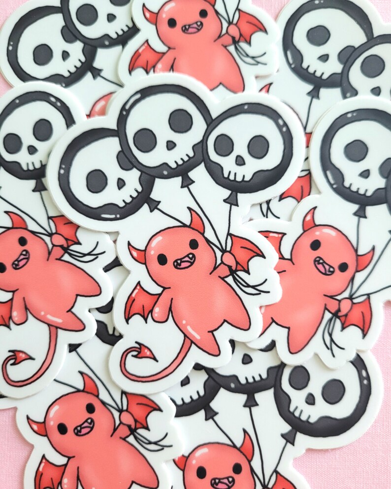 May include: A collection of stickers featuring cute red cartoon devils holding black and white skull balloons. The stickers are on a pink background.