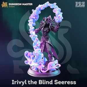 May include: A detailed figurine of Irivyl the Blind Seeress, a fantasy character, stands on a circular base. She is clad in ornate armor and a flowing robe, with a swirling blue and purple energy effect surrounding her. The text "Dungeon Master Stash" is visible.