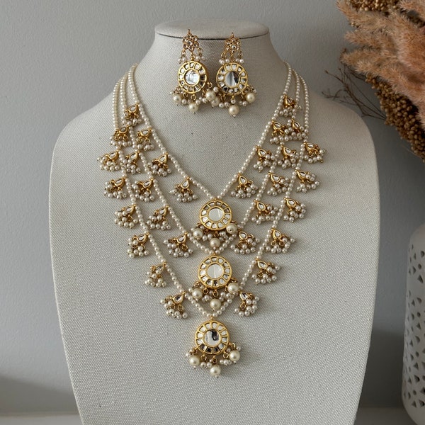 Pearly Charm Triple Strand Kundan Necklace main image 1