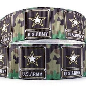 May include: Green, brown, and black camouflage ribbon with a repeated pattern of a white star inside a black square with the text "U.S. ARMY" printed below the star.