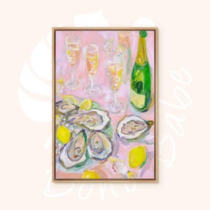 May include: An artistic painting of a celebratory scene. The artwork features a green champagne bottle, fluted glasses filled with a bubbly beverage, oysters, and lemon slices on a pink background. The painting is framed in a wooden frame.