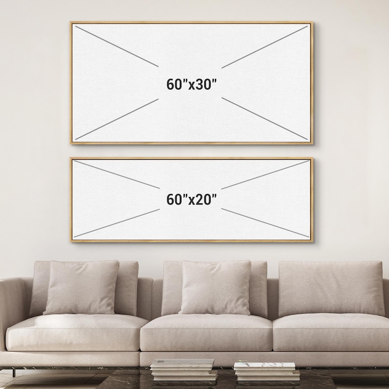May include: Two framed canvas art pieces, one 60"x30" and the other 60"x20", are displayed on a white wall. The frames are a light brown color. The text "60"x30"" and "60"x20"" are printed on the canvas. A beige sofa is in the foreground.