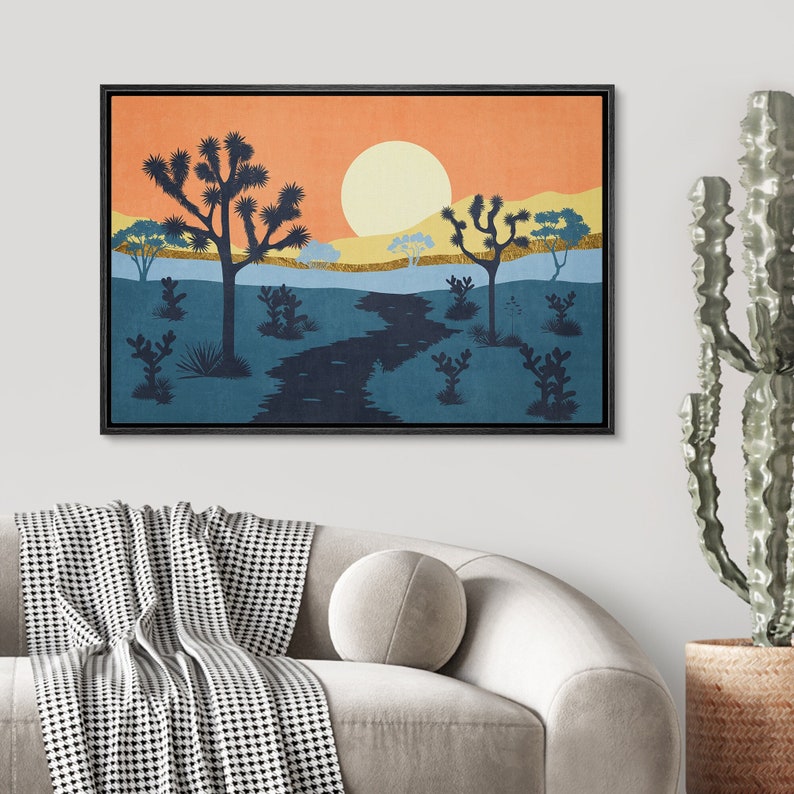 K&ouml;nnte beinhalten: Ein digitaler Kunstdruck eines W&uuml;stenlandschafts mit einem Sonnenuntergangshimmel. Der Druck zeigt eine Silhouette eines Joshua Tree und einen gewundenen Fluss im Vordergrund. Der Himmel ist ein Farbverlauf von Orange, Gelb und Blau.