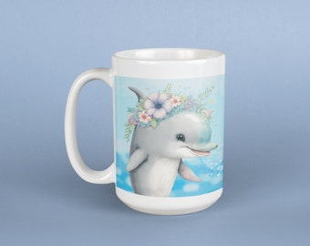 May include: White ceramic mug with a colorful illustration of a dolphin wearing a flower crown and swimming in blue water.