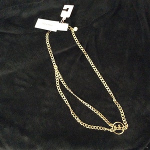 Juicy Couture gouden gevlochten riem met tags