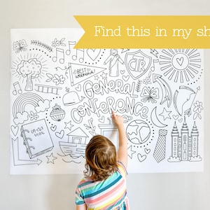 May include: A large white paper poster featuring black line art illustrations including the text General Conference, a CTR shield, a temple, a rainbow, a whale, a book, and various nature motifs. The poster is displayed on a plain wall surface.