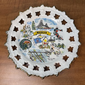 Michigan Souvenir Plate 8” Mackinac Bridge, Sault Ste. Marie Soo Locks, Skiing, Black Bear, Deer, Indian.