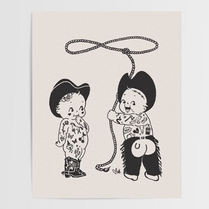 May include: Black and white illustration of two babies dressed as cowboys. One baby is wearing a cowboy hat and holding a lasso. The other baby is wearing a cowboy hat and chaps and has tattoos on their arms and legs.