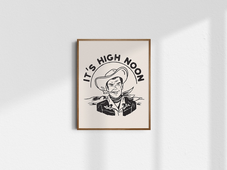 May include: Black and white illustration of a cowboy wearing a hat and smoking a pipe. The text "It's High Noon" is written in a circle around the cowboy.