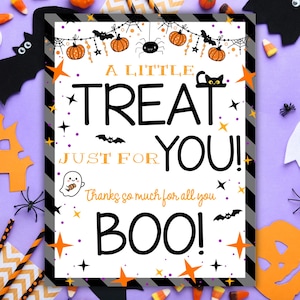 May include: A rectangular Halloween sign with a black and gray striped border. The white center features orange pumpkins, black bats, a spider, and a ghost. Text reads: A LITTLE TREAT JUST FOR YOU! Thanks so much for all you BOO! with orange stars.