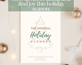 May include: A cream-colored planner titled "The Mindful Holiday Planner" with a Christmas tree graphic. The text "Slow down, breathe, and find joy this holiday season" is at the top. The planner is surrounded by gold ornaments and pinecones.