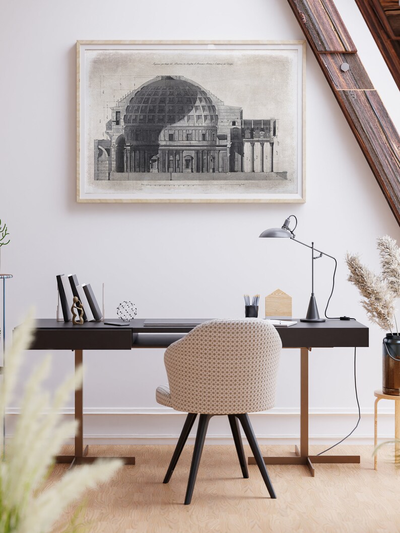 Puede incluir: Un dibujo arquitect&oacute;nico en blanco y negro del Pante&oacute;n de Roma, Italia. El dibujo muestra el interior y el exterior del edificio, incluyendo la c&uacute;pula y las columnas. El dibujo est&aacute; enmarcado y colgado en una pared blanca.