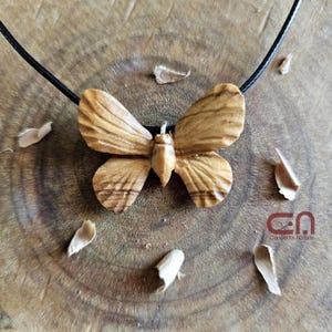 Butterfly necklace. Pendant hand carved in olive Wood.