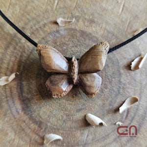 Butterfly necklace. Pendant hand carved in olive Wood.