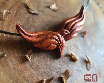 Fenix necklace. Pendant hand carved in plum wood