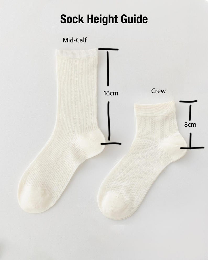 May include: A sock height guide showing two white socks. The mid-calf sock is 16cm long, and the crew sock is 8cm long. The text "Sock Height Guide" is at the top of the image.