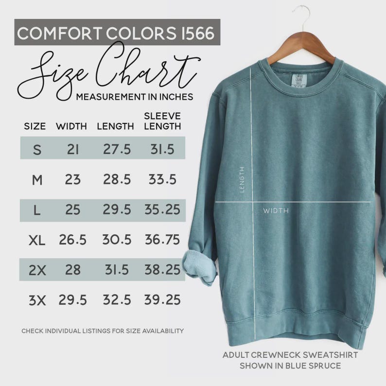 May include: Blue spruce adult crewneck sweatshirt displayed on a wooden hanger. The image includes a size chart with measurements in inches for width, length, and sleeve length. The size chart includes sizes S, M, L, XL, 2X, and 3X.