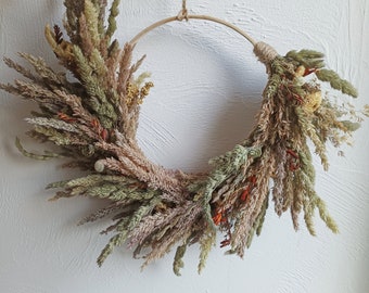 Dried Montbretia, Meadow Sweet and Wild Grass Wreath on Bamboo