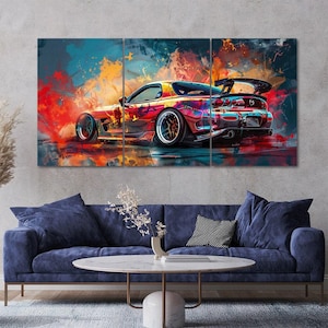 May include: A three-panel wall art set depicting a sports car in a vibrant, abstract style. The car features a low-profile body, a rear spoiler, and wide wheels, set against a dynamic background of swirling orange, red, and blue paint splashes.
