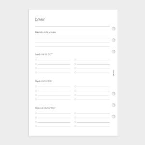 May include: A white planner refill page with black text and lines. The header reads Janvier, followed by Priorités de la semaine. It lists Lundi 04/01/2027, Mardi 05/01/2027, and Mercredi 06/01/2027 with bullet points and lines. Six binder holes are on the right.