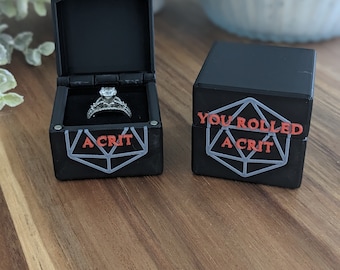 D20 Você rolou uma caixa de anel crítico (proposta única, presente, portador do anel, etc.) Dados de 20 lados
