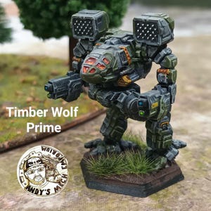 May include: A green and grey painted miniature robot, called a Timber Wolf Prime, stands on a black hexagonal base with green grass. The robot has two large guns on its shoulders and a smaller gun on its arm.