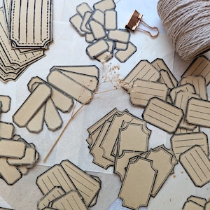 Découpes de papier • petites étiquettes • pièces éphémères • album • journal d'art • 50 pièces