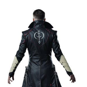 May include: Black leather coat with a long design, featuring a white emblem on the back and red stitching accents. The coat has a wide collar, decorative arm cuffs, and a tailored fit. The coat is a stylish piece of outerwear.