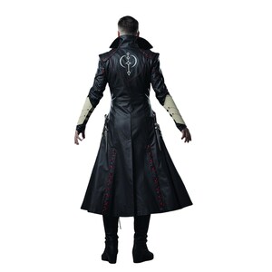 May include: Black leather coat with red stitching details and a white emblem on the back. The coat features a long, flowing design with decorative elements on the sleeves and front. The model is wearing black boots and pants.