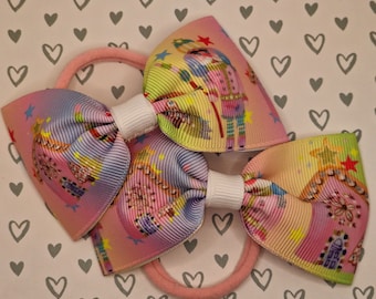 Pink Christmas Nutcracker Gingerbread House Hair Bow PAIR. Hair tie or Clip. Medium Bows - Delivered Duty Paid to USA.