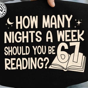 May include: Black tote bag with the text "HOW MANY NIGHTS A WEEK SHOULD YOU BE READING?" in white. The number "67" is displayed over an open book illustration. The bag also has a logo in the upper left corner.