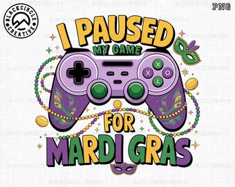 May include: Purple and green graphic design with a purple video game controller, beads, and the text "I Paused My Game For Mardi Gras".