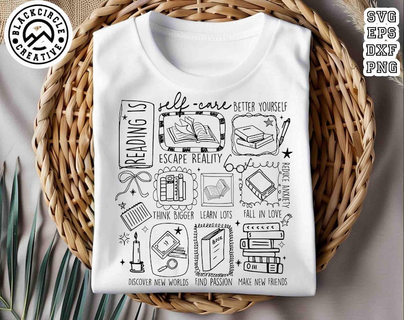May include: White t-shirt with a black graphic design featuring the words "Reading Is" and various book-related illustrations. The design includes phrases like "Escape Reality" and "Discover New Worlds."