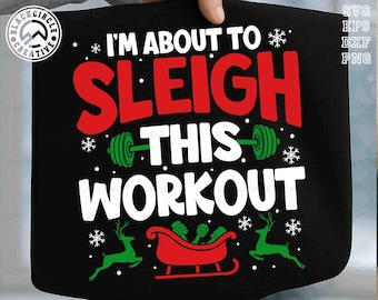 May include: Black graphic design with the text "I'M ABOUT TO SLEIGH THIS WORKOUT" in red and white. The design includes snowflakes, a barbell, a red sleigh, and green reindeer. The design also includes the text "SVG EPS DXF PNG".