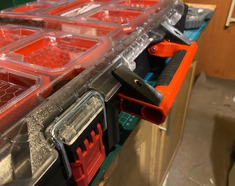 Packout organiser lid locks with fixing