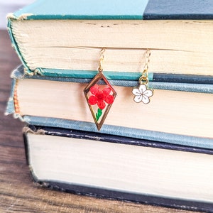 Red dried pressed flower resin charm bookmark.