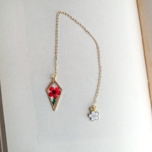 Real red flower charm bookmark.