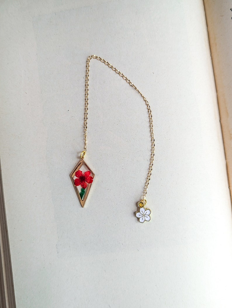 Real red flower charm bookmark.