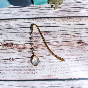 These hook bookmarks are a little under 3.5" long. Small and dainty.
