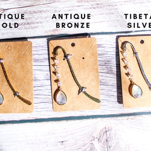 Antique gold, antique bronze, or Tibetan silver metal bookmarks.