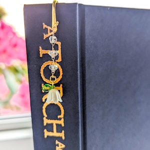 Flower orchid bookmark in the hardback book.