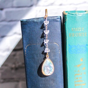 Short hook bookmark with crystals and chain.