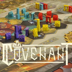 May include: A board game with a hexagonal game board and colorful miniature buildings and structures. The game pieces are in shades of blue, red, yellow, and purple. The game board has a variety of terrain tiles and the word "COVENANT" is displayed in white.