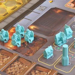 May include: A board game with a detailed game board and several teal-colored game pieces. The pieces include miniature buildings, archways, and figures. The board features various sections with different designs and colors, creating a complex layout.