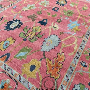 Handmade Pink Wool Oushak Rug: Colorful Floral Design