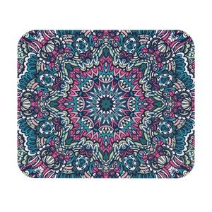 May include: A colorful mandala design with intricate patterns in shades of blue, green, pink, and white.