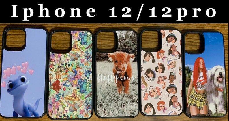 May include: Five different iPhone 12/12 Pro phone cases with various designs. The cases are black with a clear plastic back. The designs include a cartoon character, a cartoon pattern, a highland cow, a pattern of cartoon princesses, and a woman with a dog.